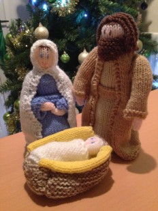 Figures of Mary, Joseph and baby Jesus in a manger